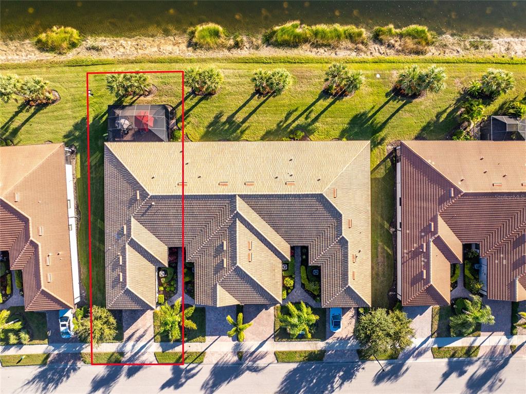 13869 Alafaya Street Venice, FL 34293 - Photo 47 of 75 an aerial view of beach and residential building with outdoor space