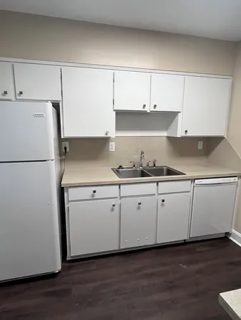a kitchen with a stove and a microwave