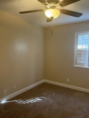 a view of room with hardwood floor