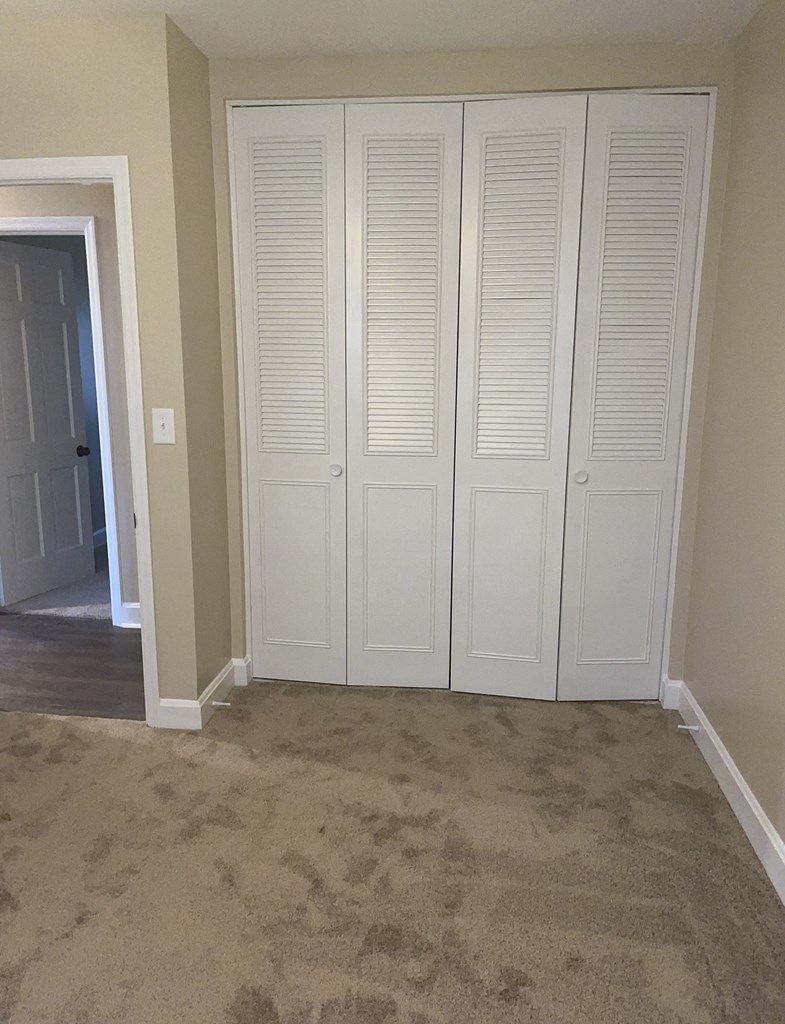 2312 15th Street, Unit C Columbus, GA 31906 - Photo 20 of 26 a view of room with hardwood floor