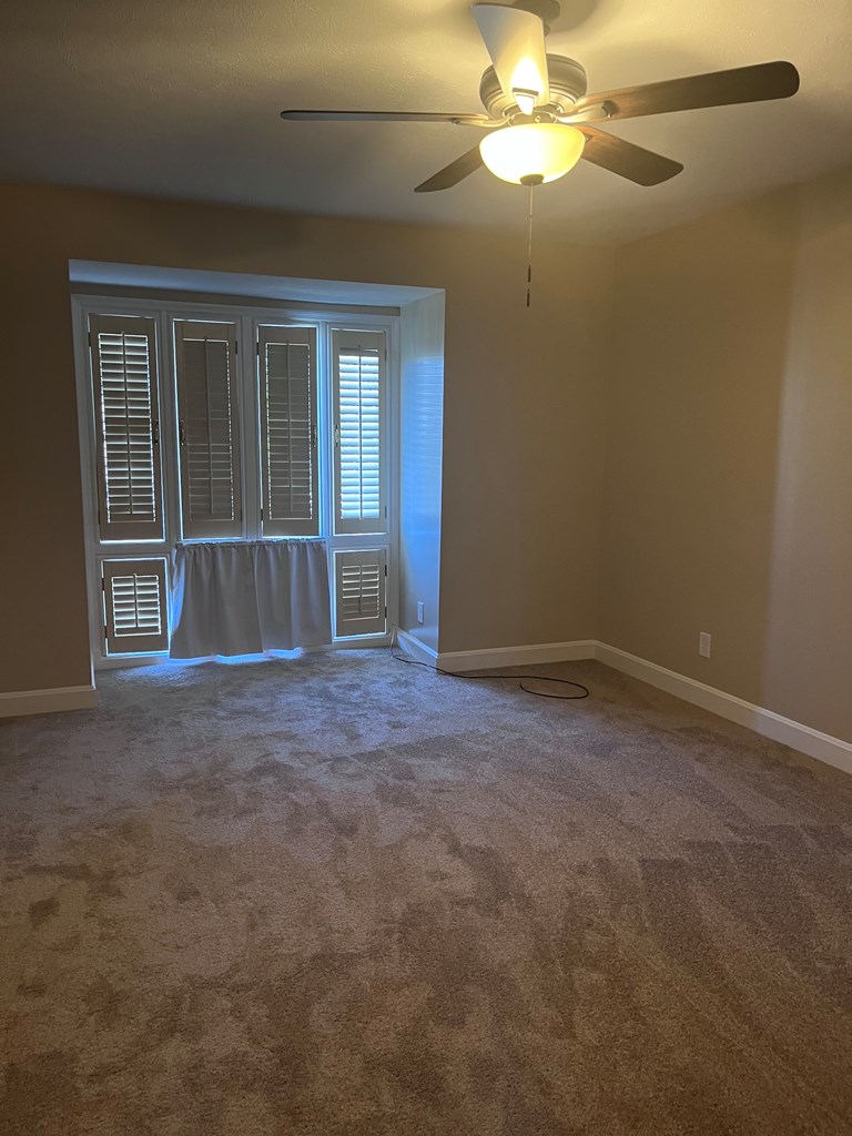 2312 15th Street, Unit C Columbus, GA 31906 - Photo 21 of 26 a view of empty room with window