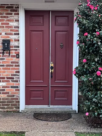 an empty room with wooden floor