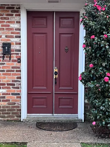 an empty room with wooden floor