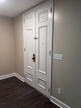a view of entryway with wooden floor
