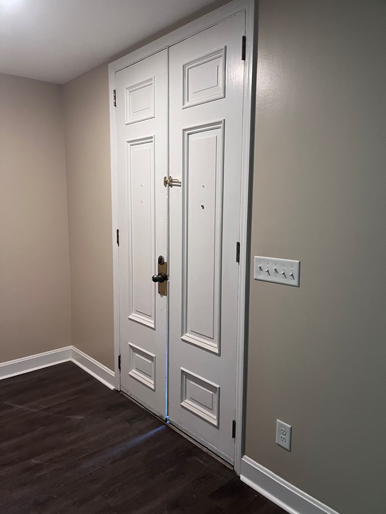 2312 15th Street, Unit C Columbus, GA 31906 - Photo 4 of 26 an empty room with wooden floor