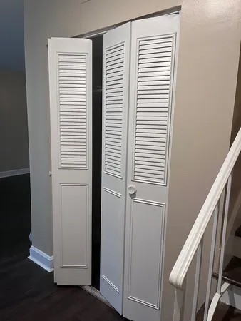 a view of a livingroom with wooden floor