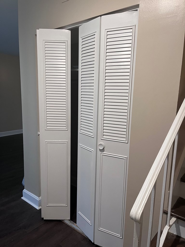 2312 15th Street, Unit C Columbus, GA 31906 - Photo 6 of 26 a view of entryway with stairs and wooden floor