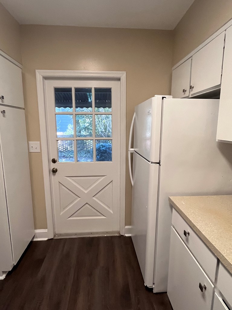 2312 15th Street, Unit C Columbus, GA 31906 - Photo 10 of 26 a view of kitchen with wooden floor and electronic appliances