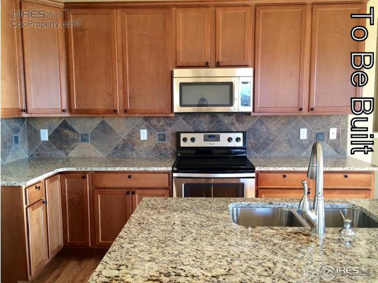 815 Wagon Bend Road Berthoud, CO 80513 - Photo 3 of 16 Same cabinets are in this home