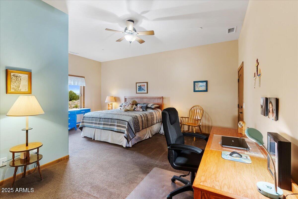 6750 Pinyon Pine Circle Rimrock, AZ 86335 - Photo 25 of 53 Bedroom 2 with Exit to Center Courtyard