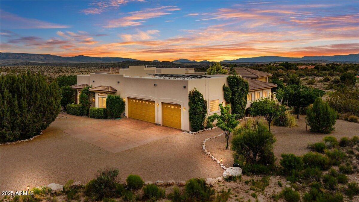 6750 Pinyon Pine Circle Rimrock, AZ 86335 - Photo 41 of 53 Aerial Dusk 3-Car Garage