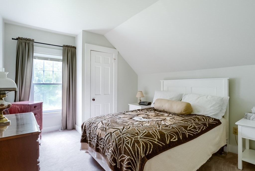 5 Leominster Road Princeton, MA 01541 - Photo 20 of 41 a bedroom with a large bed and a chair