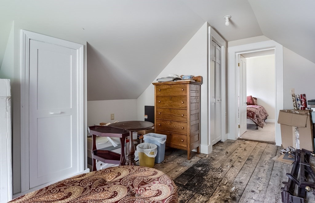 5 Leominster Road Princeton, MA 01541 - Photo 23 of 41 a bedroom with a bed and a table in it