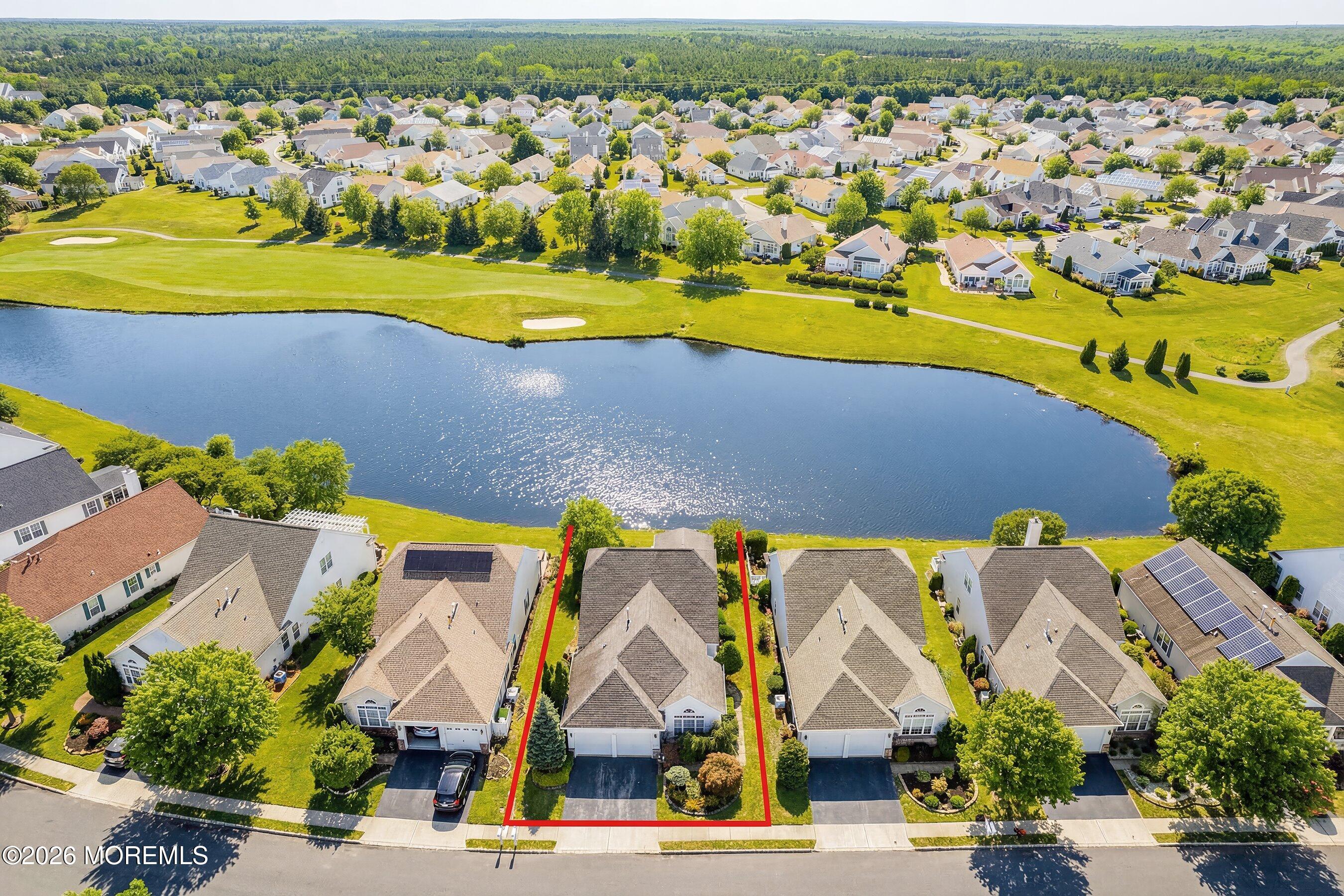 10 Arcadia Drive Manchester Township, NJ 08759 - Photo 23 of 37 an aerial view of residential houses with swimming pool and outdoor space