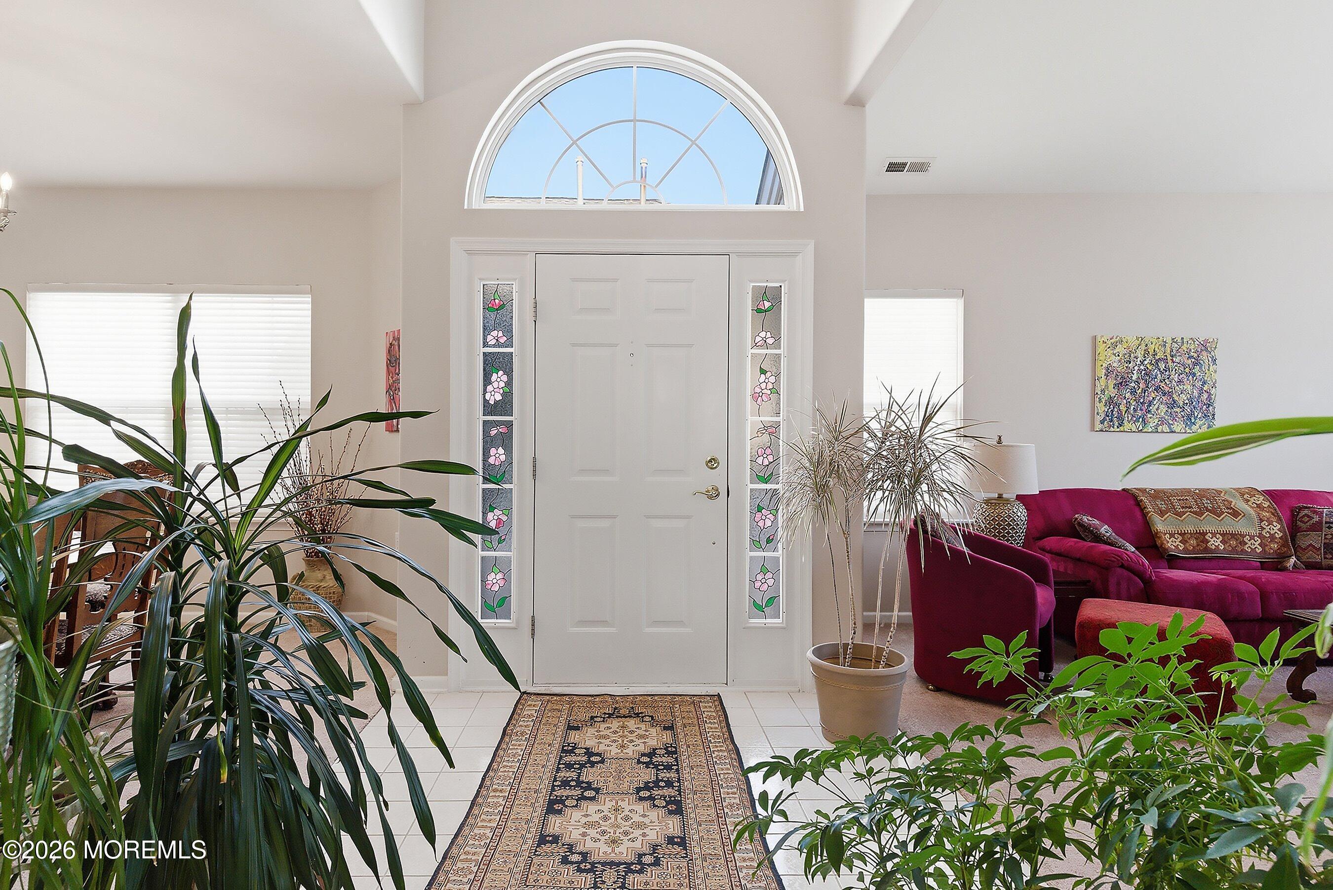 10 Arcadia Drive Manchester Township, NJ 08759 - Photo 3 of 37 a view of a entryway with furniture