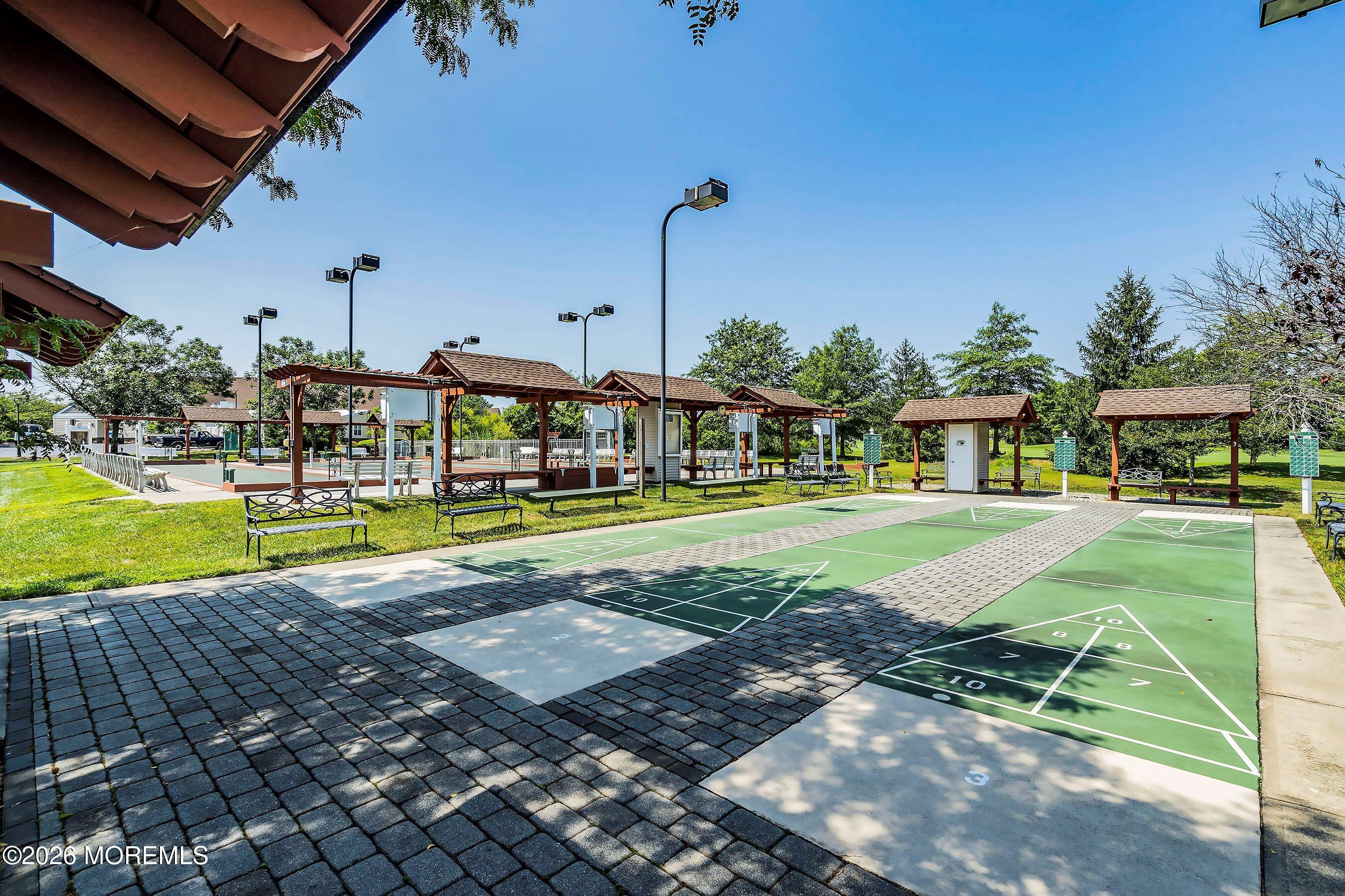 10 Arcadia Drive Manchester Township, NJ 08759 - Photo 31 of 37 a view of a swimming pool with a yard