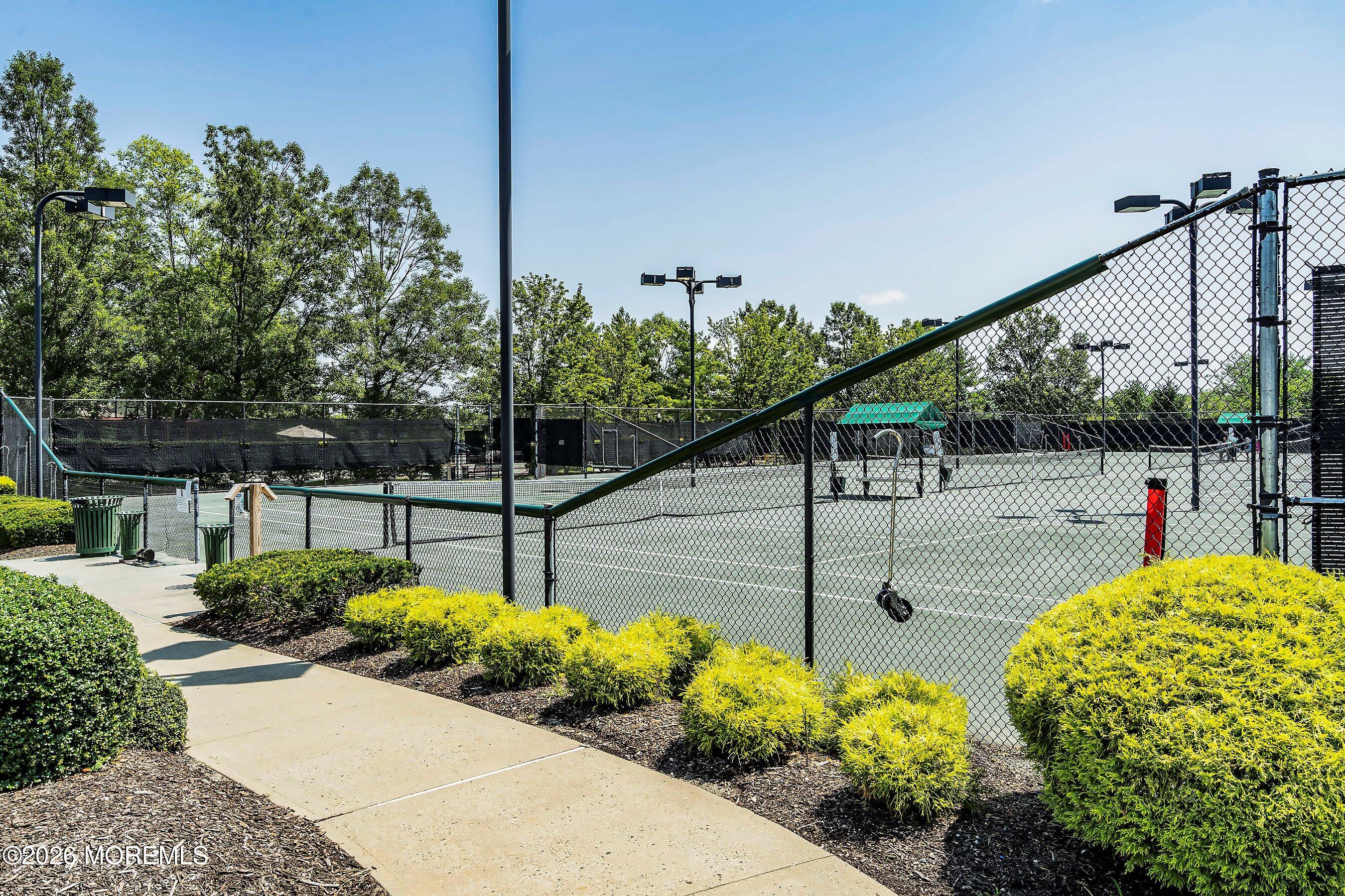 10 Arcadia Drive Manchester Township, NJ 08759 - Photo 32 of 37 a view of a garden with a flower garden