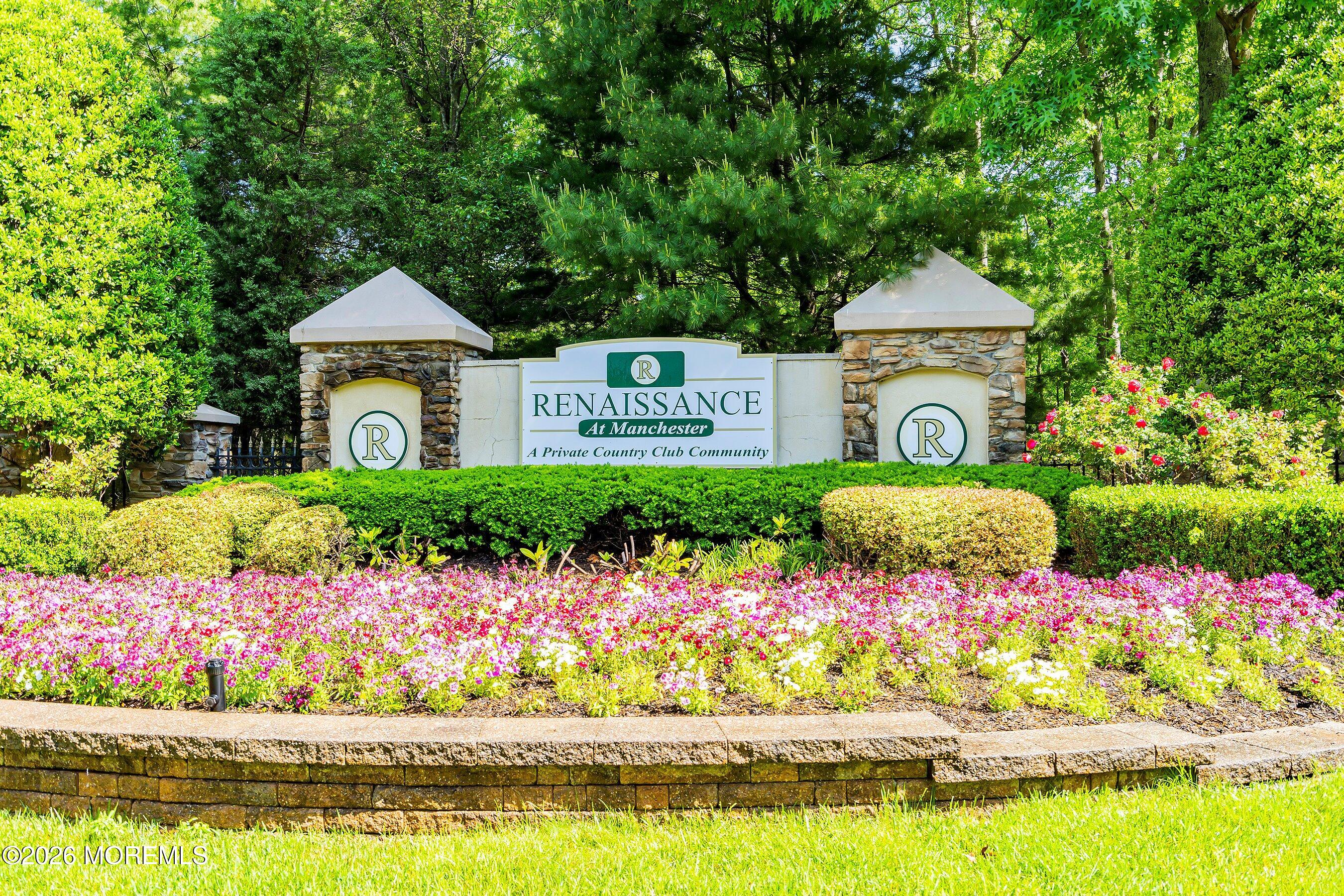 10 Arcadia Drive Manchester Township, NJ 08759 - Photo 36 of 37 a front view of a house with a garden and lake view