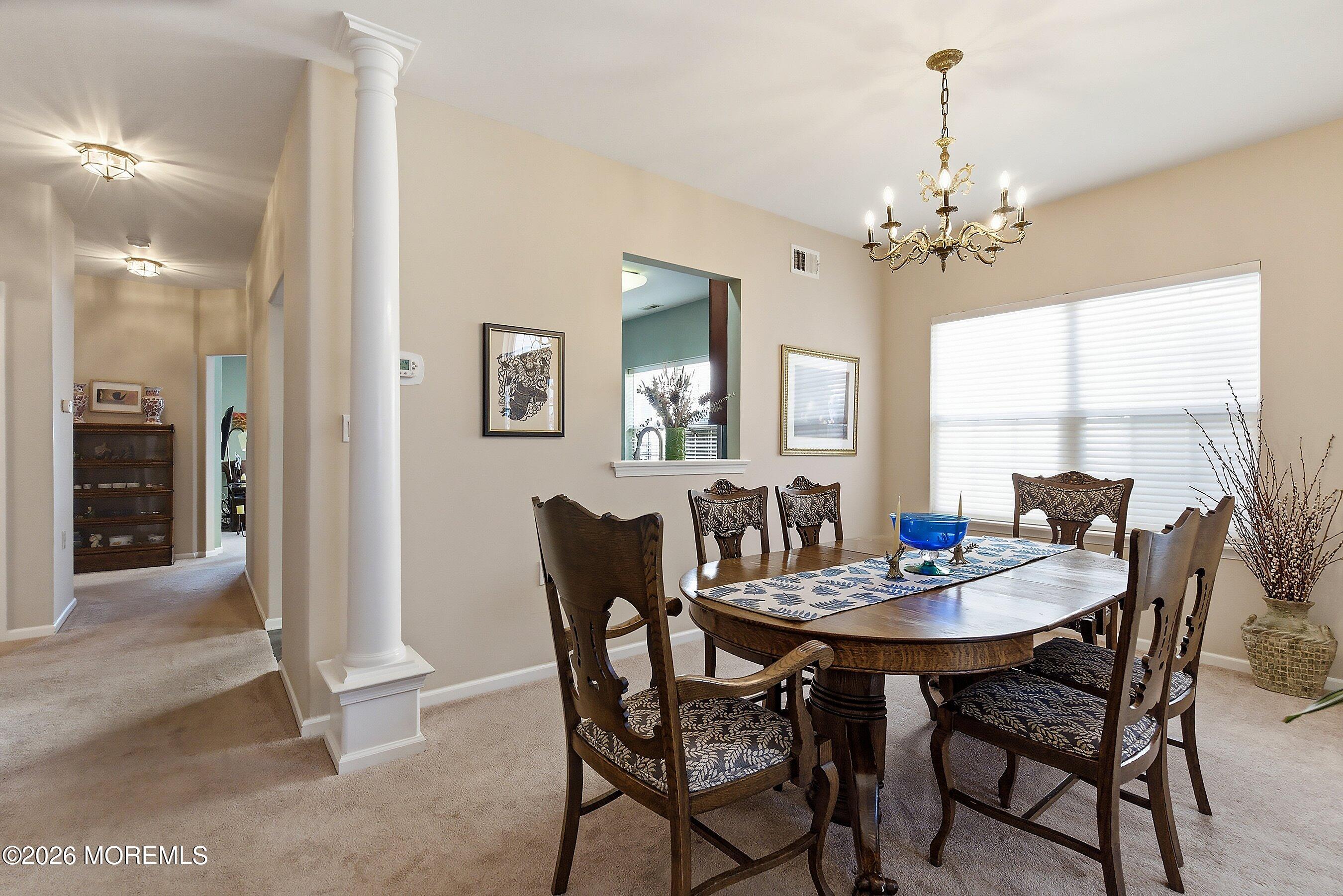 10 Arcadia Drive Manchester Township, NJ 08759 - Photo 5 of 37 a view of a dining room with furniture and window
