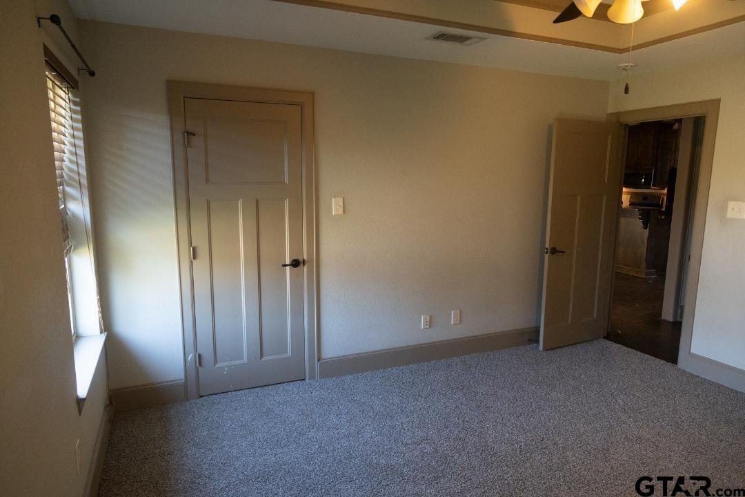 300 Rita Drive Lindale, TX 75771 - Photo 13 of 17 an empty room with closet and a bathroom