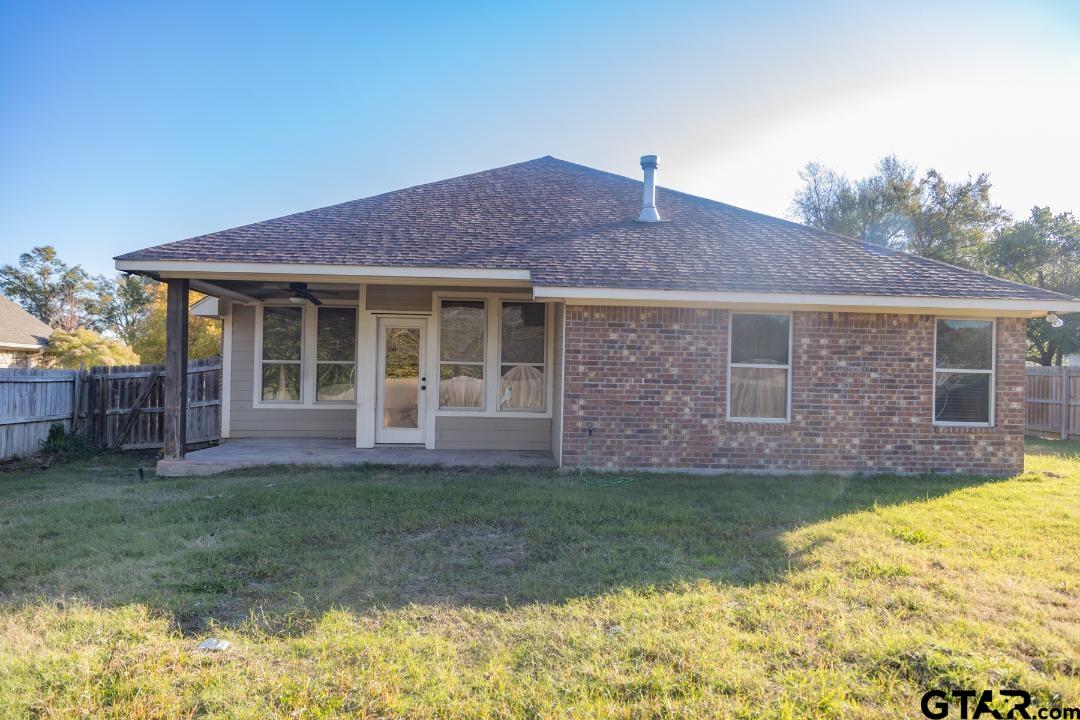 300 Rita Drive Lindale, TX 75771 - Photo 17 of 17 a brick house with garden in front of it