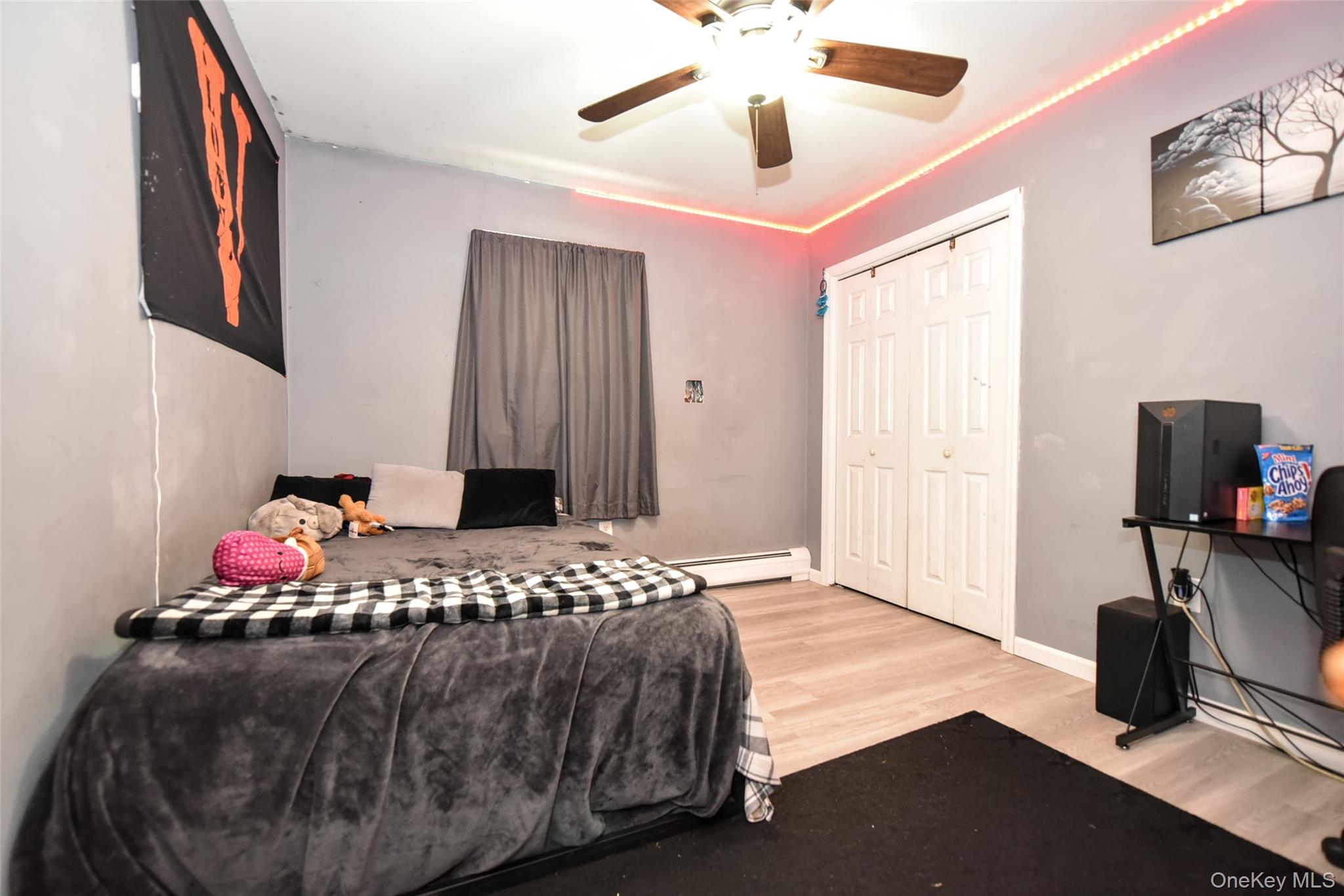 121 Hammond Road Thiells, NY 10984 - Photo 13 of 27 a bedroom with a bed and a flat screen tv