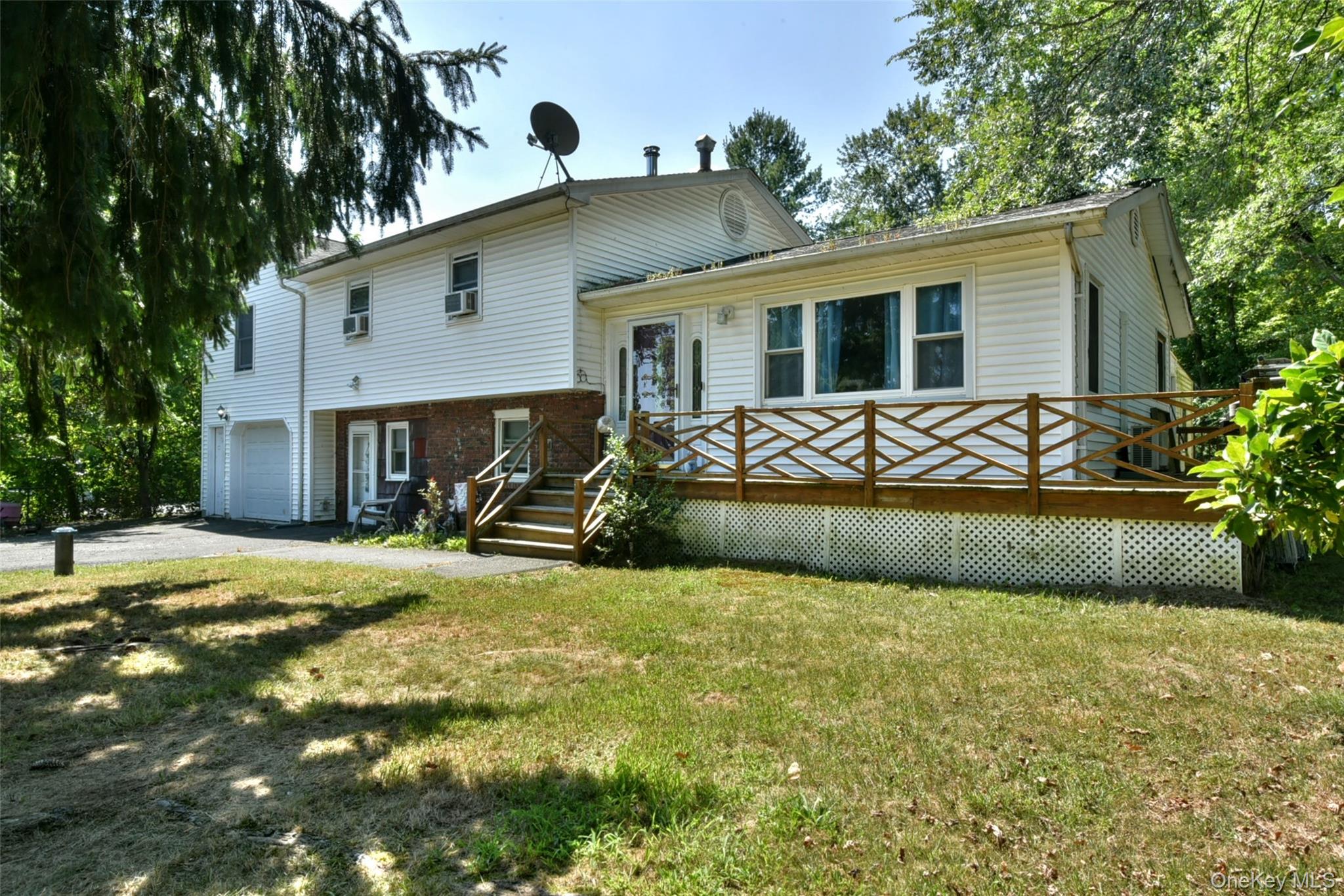 121 Hammond Road Thiells, NY 10984 - Photo 2 of 27 a view of a house with backyard and sitting area