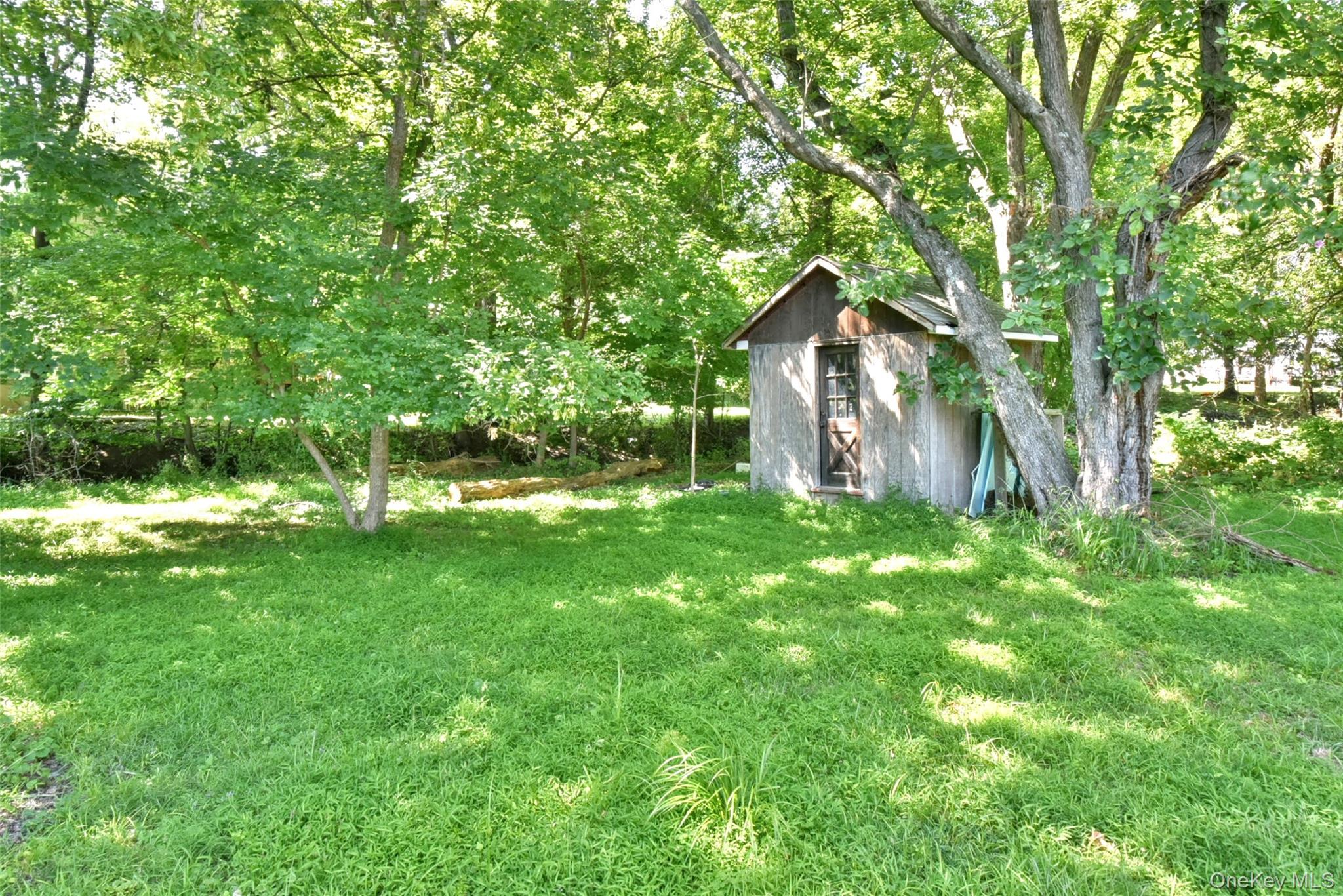 121 Hammond Road Thiells, NY 10984 - Photo 22 of 27 a front view of a house with a yard