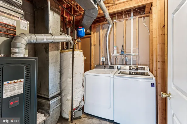 a view of an empty room with a fireplace