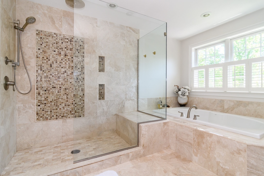 2 Hunters Lane Natick, MA 01760 - Photo 20 of 40 a bathroom with a bath tub and a shower