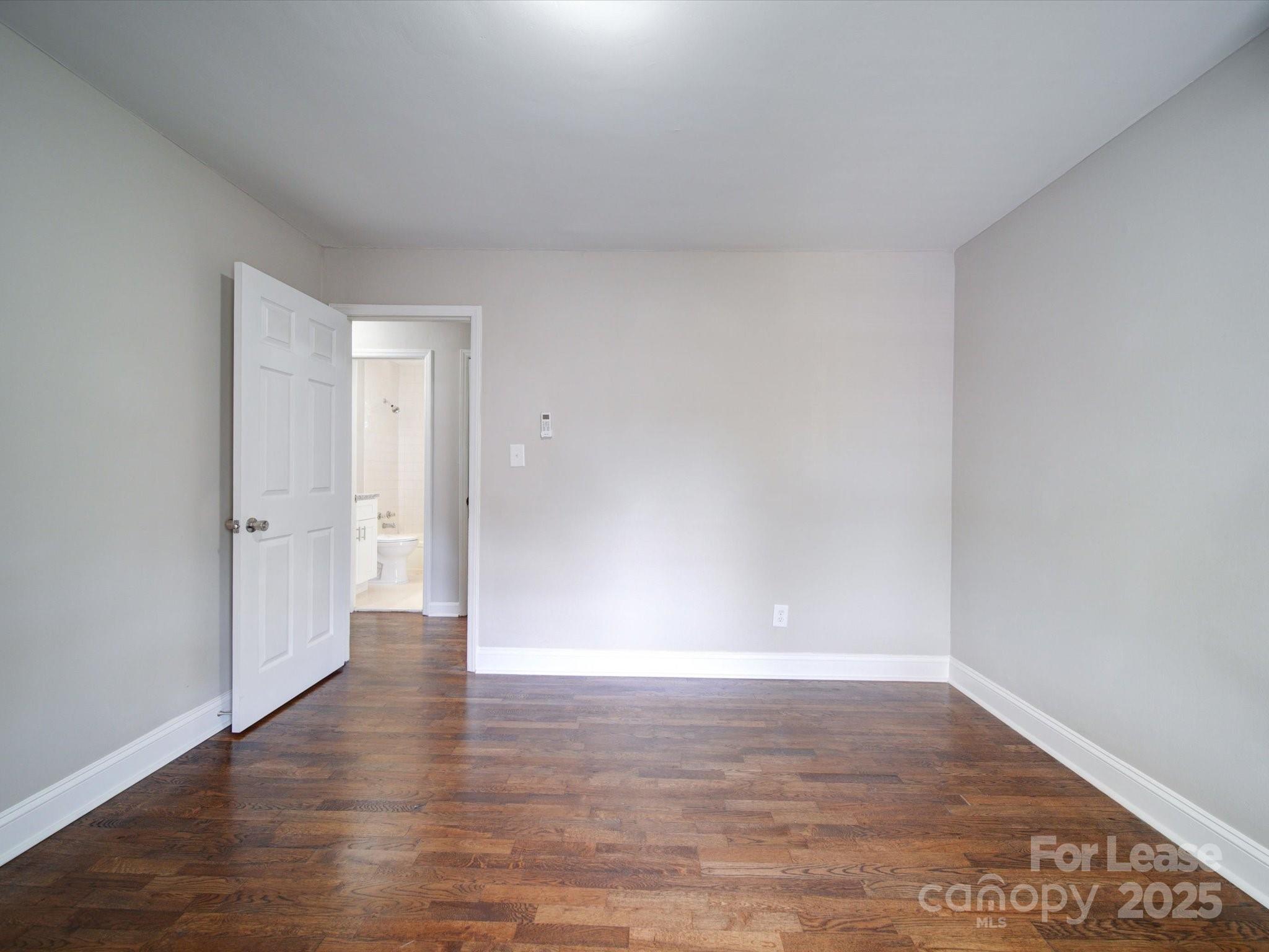321 South Gardner Avenue, Unit 6 Charlotte, NC 28208 - Photo 35 of 35 a view of an empty room and wooden floor