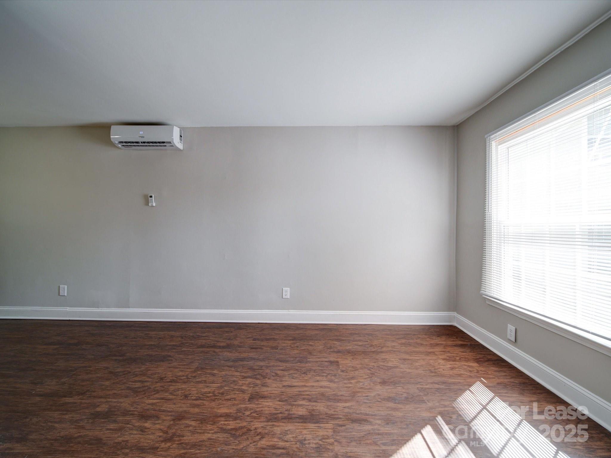 321 South Gardner Avenue, Unit 6 Charlotte, NC 28208 - Photo 5 of 35 a view of an empty room with a window