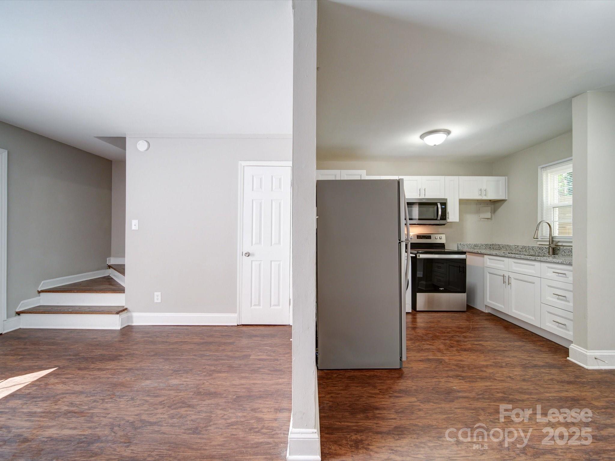 321 South Gardner Avenue, Unit 6 Charlotte, NC 28208 - Photo 10 of 35 a view of kitchen with wooden floor
