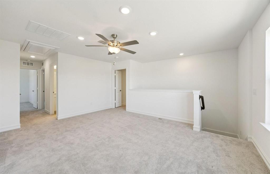 1616 Prosper Lane Anna, TX 75409 - Photo 7 of 12 an empty room with closet and a ceiling fan