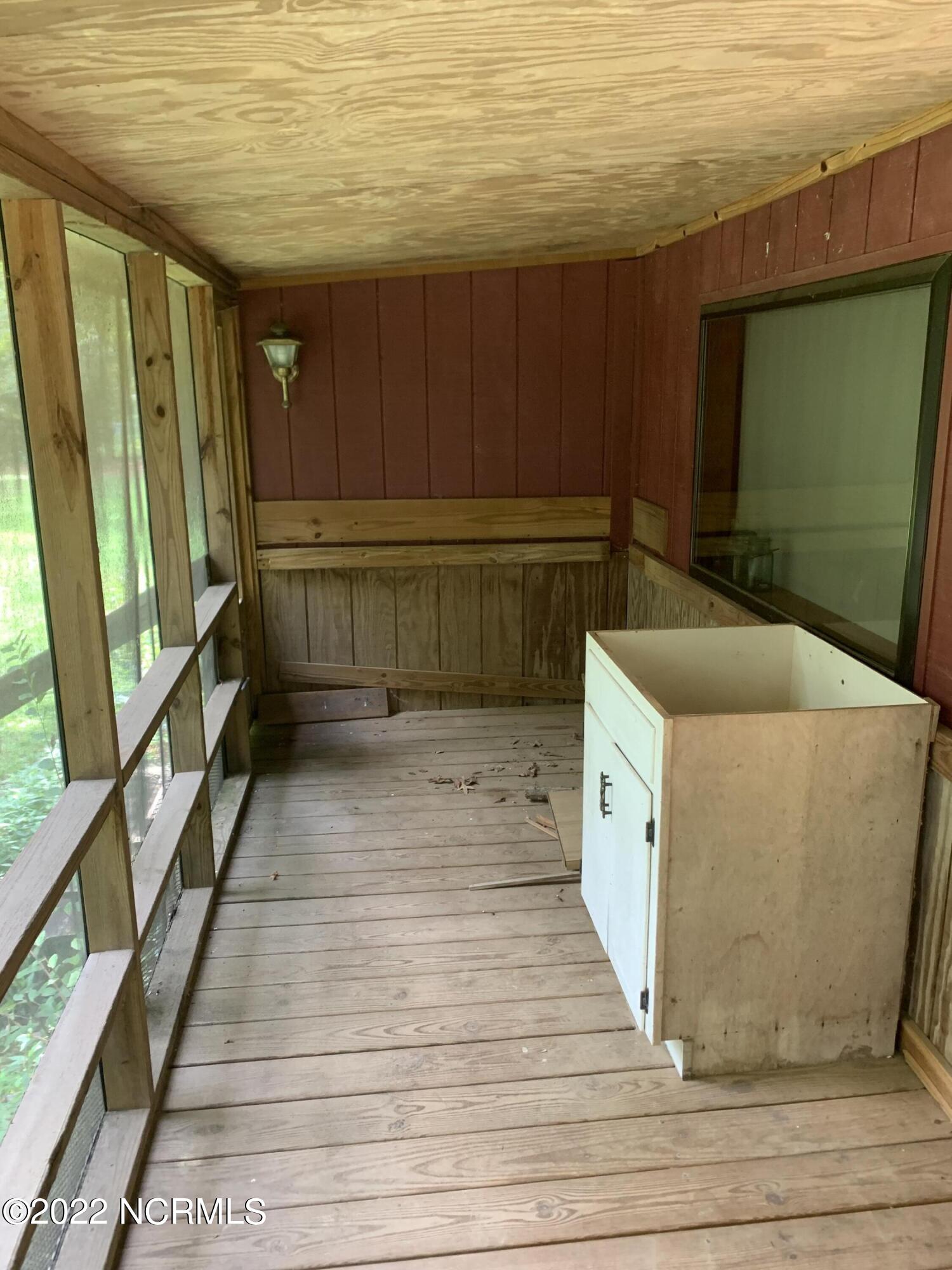 210 Buckhorn Church Road Como, NC 27818 - Photo 26 of 28 Screened Porch
