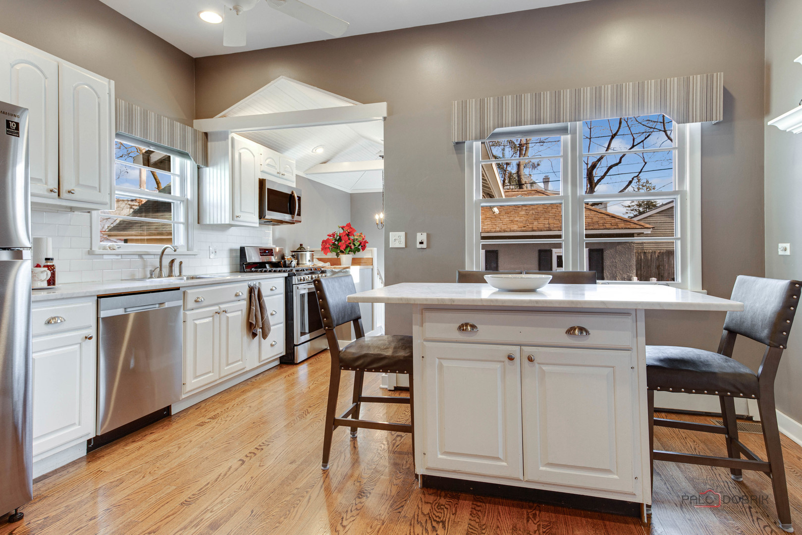 140 Summit Place Lake Forest, IL 60045 - Photo 12 of 39 a kitchen with a sink cabinets and wooden floor