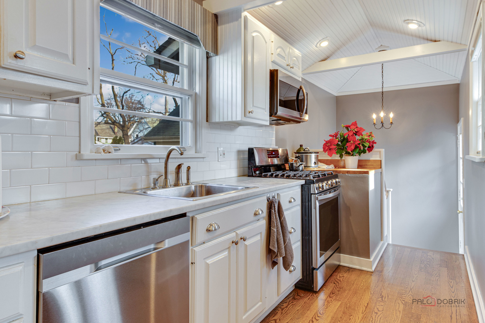 140 Summit Place Lake Forest, IL 60045 - Photo 13 of 39 a kitchen with stainless steel appliances granite countertop a sink dishwasher a refrigerator and cabinets with wooden floor