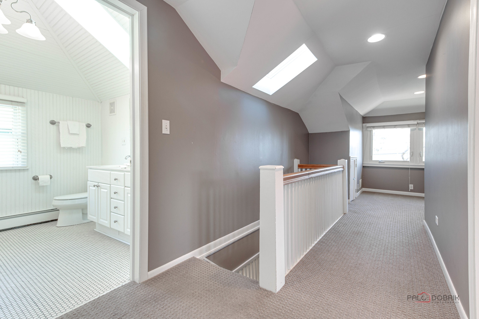 140 Summit Place Lake Forest, IL 60045 - Photo 22 of 39 a view of a hallway with bathroom and wooden floor