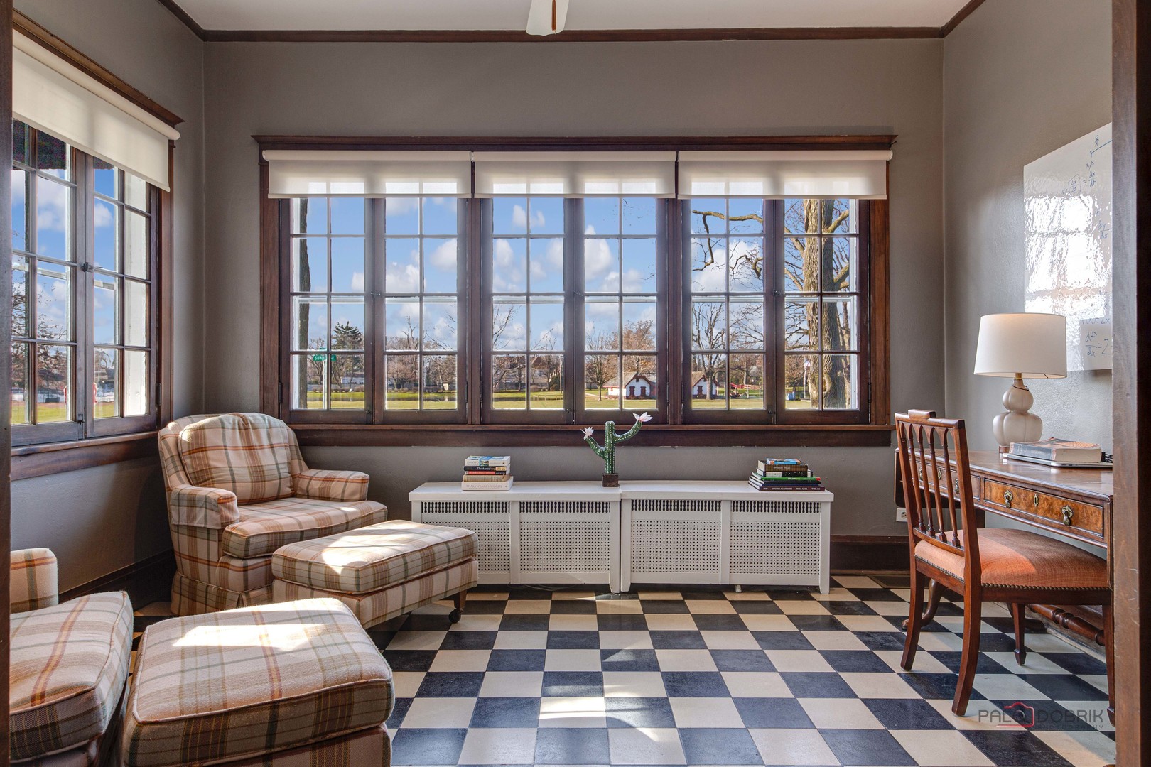 140 Summit Place Lake Forest, IL 60045 - Photo 9 of 39 a living room with furniture and a floor to ceiling window