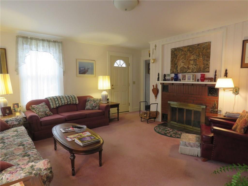 222 Main Road South Hampden, ME 04444 - Photo 14 of 35 A formal room, with fireplace.