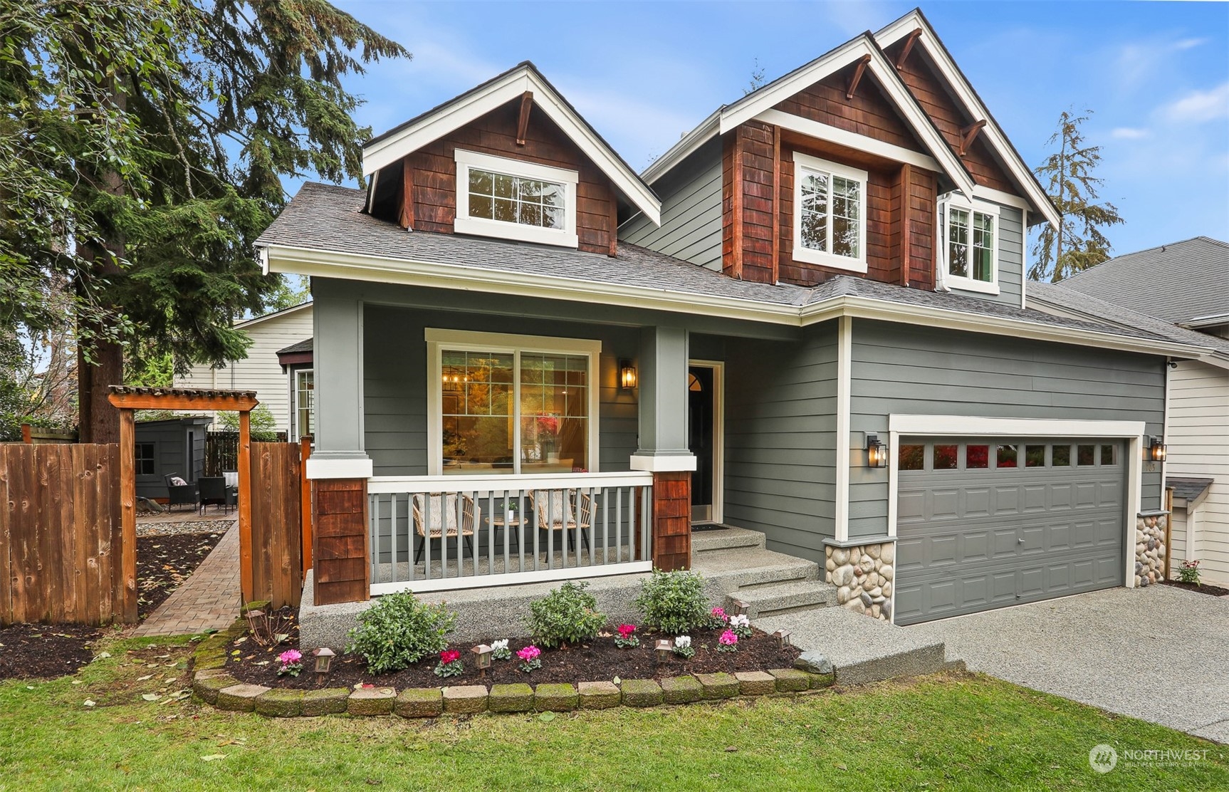 105 170th Street Southeast Bothell, WA 98012 - Photo 1 of 33 a front view of a house with garden
