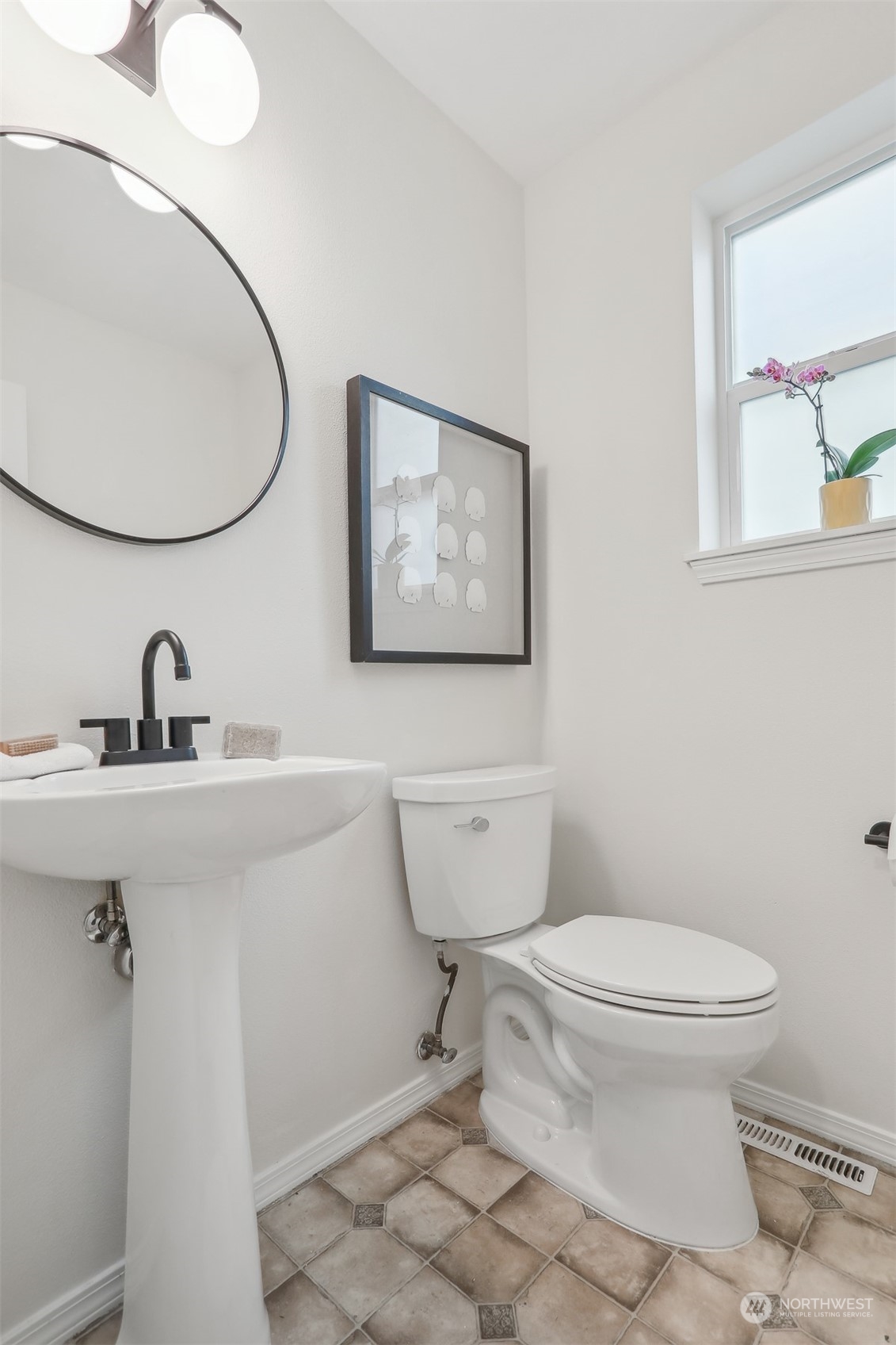 105 170th Street Southeast Bothell, WA 98012 - Photo 15 of 33 a bathroom with a toilet a sink and mirror