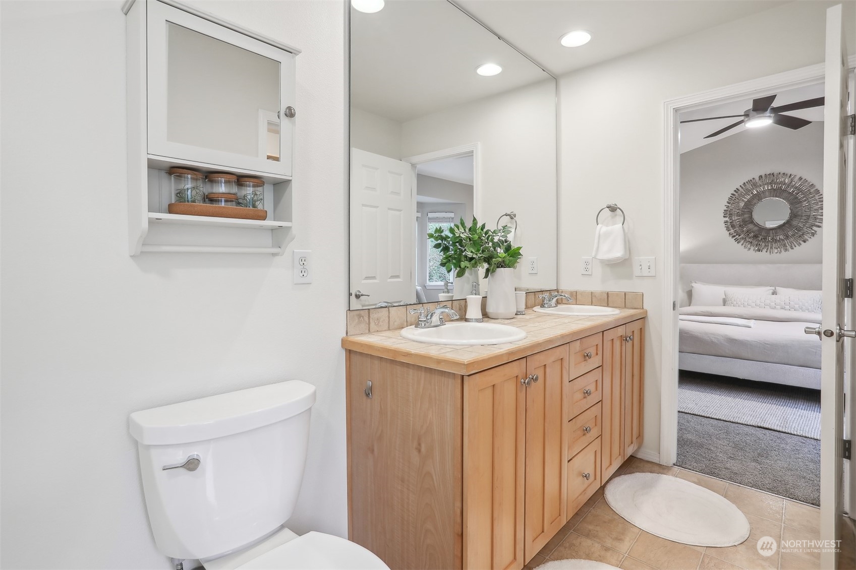 105 170th Street Southeast Bothell, WA 98012 - Photo 19 of 33 a bathroom with a sink a toilet and a mirror