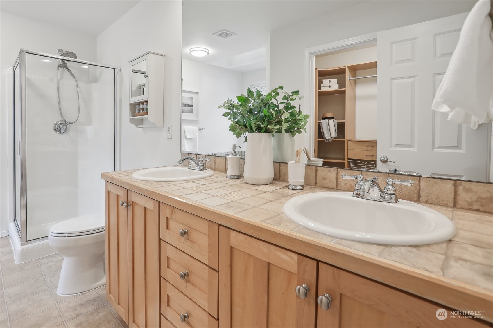 105 170th Street Southeast Bothell, WA 98012 - Photo 20 of 33 a bathroom with a granite countertop sink and a mirror