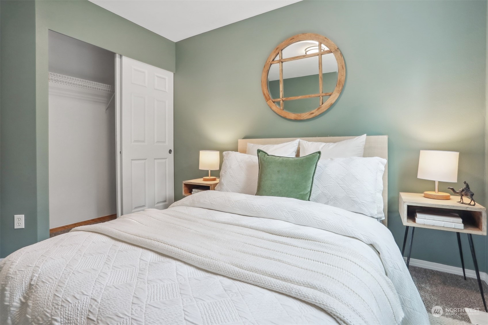 105 170th Street Southeast Bothell, WA 98012 - Photo 23 of 33 a bedroom with a bed and a mirror