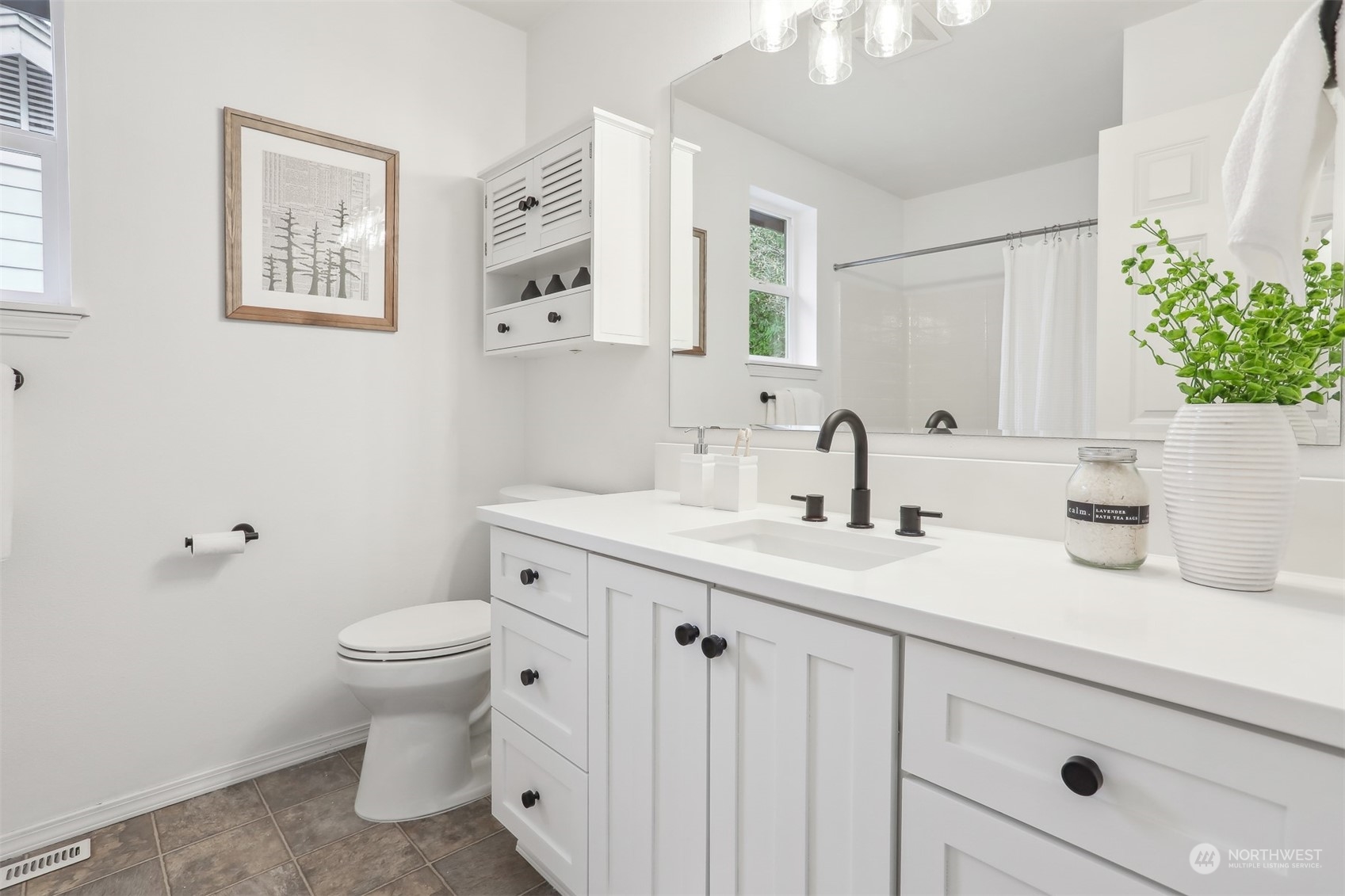 105 170th Street Southeast Bothell, WA 98012 - Photo 28 of 33 a bathroom with a toilet sink and mirror