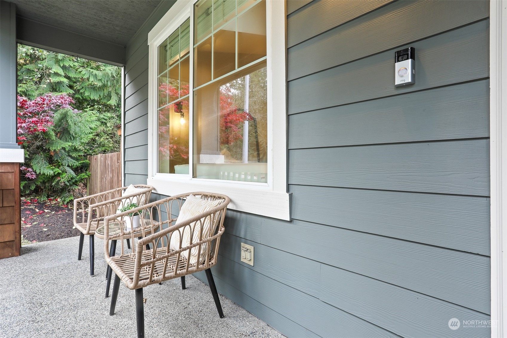 105 170th Street Southeast Bothell, WA 98012 - Photo 30 of 33 a patio with table and chairs and potted plants