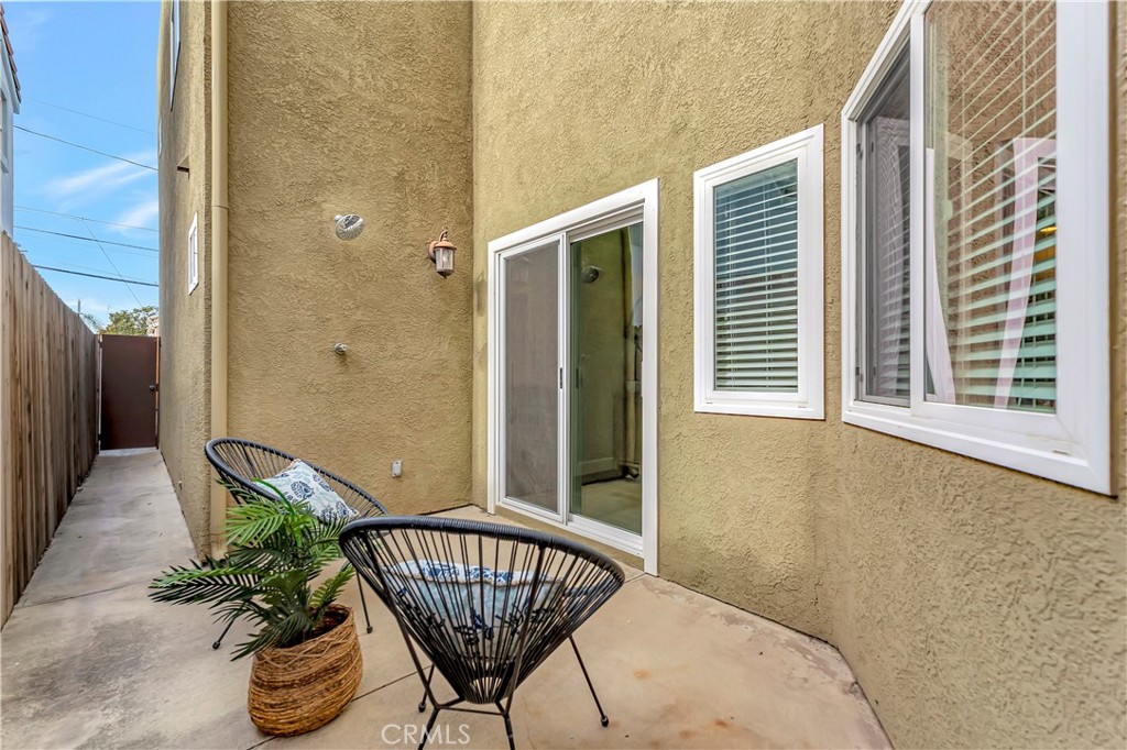 621 8th Street Huntington Beach, CA 92648 - Photo 21 of 58 a view of balcony with chair