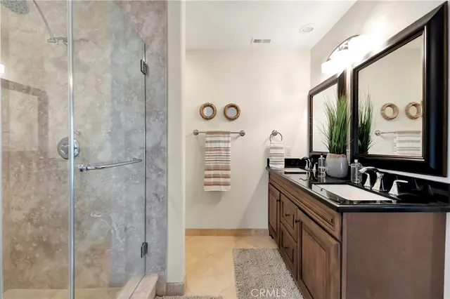 a living room with furniture large window and fireplace