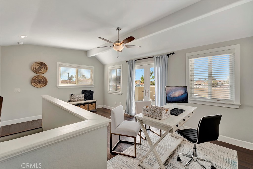 621 8th Street Huntington Beach, CA 92648 - Photo 45 of 58 a workspace with wooden floor and a window
